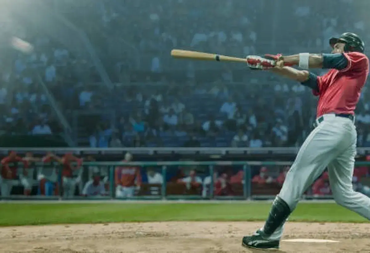 Baseball hitter focusing during pitch in major league stadium
