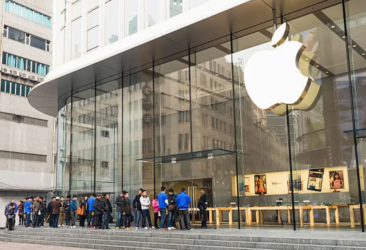 Customers lining up outside Apple Store