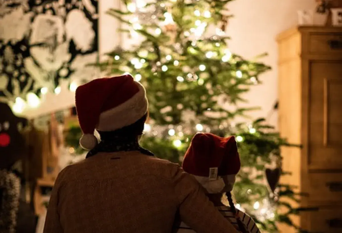 Family Christmas time by the tree