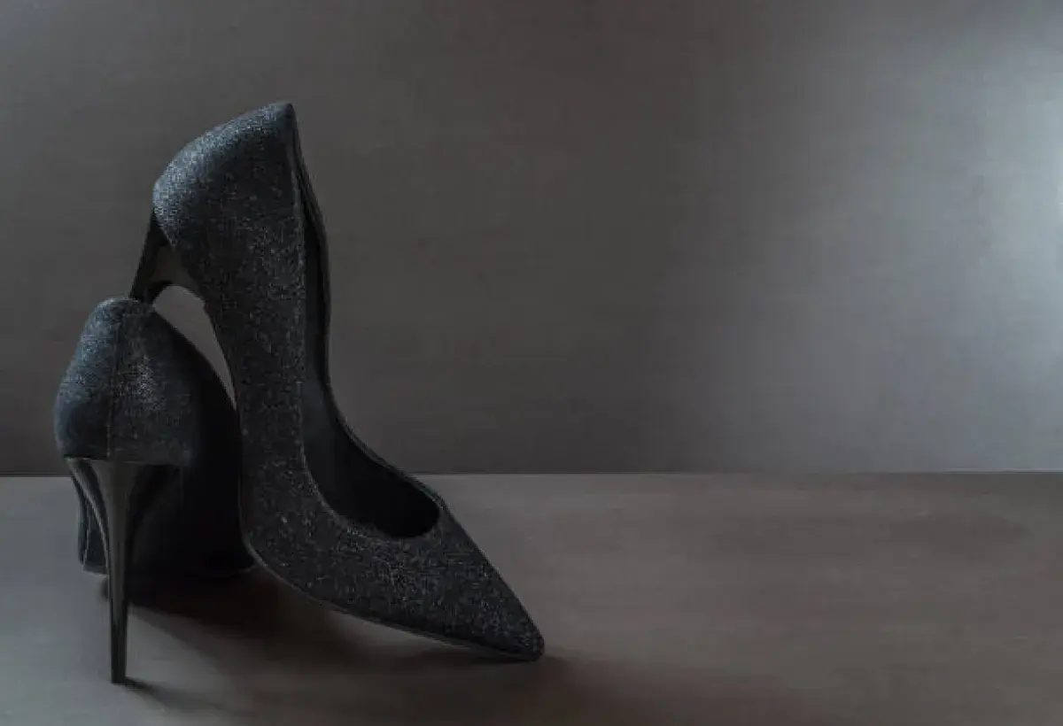 Elegant designer high heels on marble background