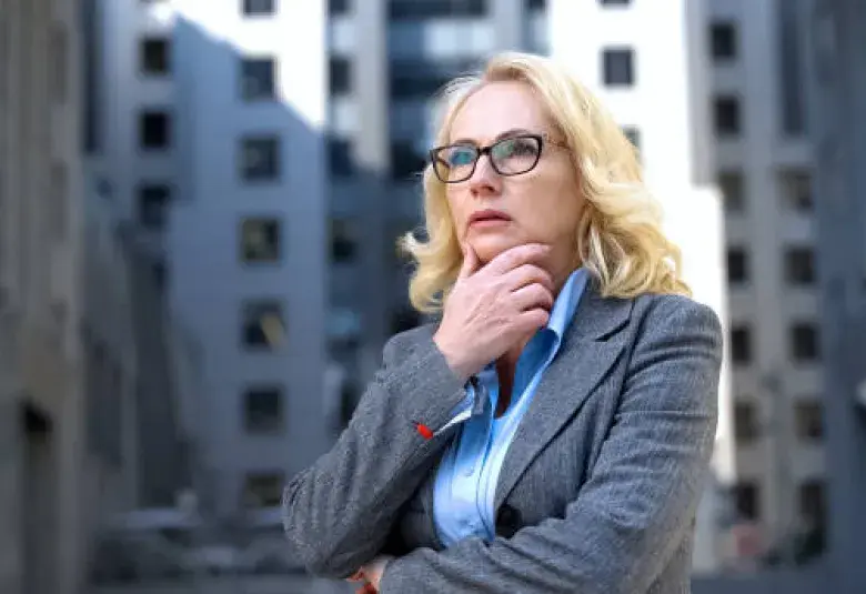 Midlife woman reflecting on life and future demographics