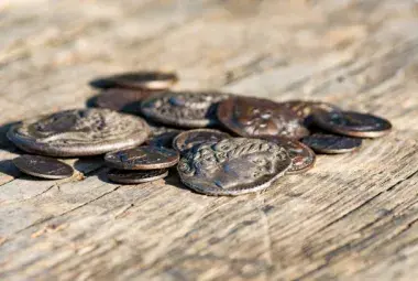 Ancient coins representing the beginning of money