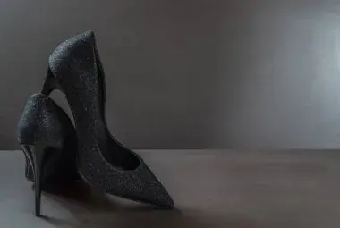 Elegant designer high heels on marble background