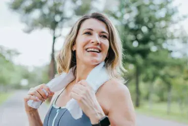 Midlife woman glowing with health and confidence