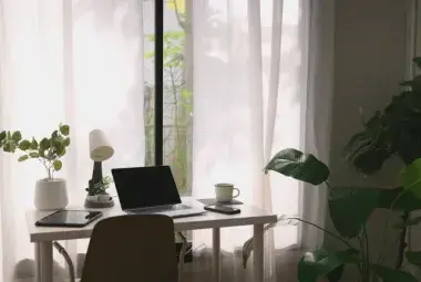 Modern home office setup representing the return of remote work in 2025