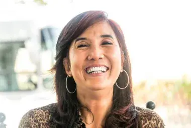 Confident Filipina embracing menopause