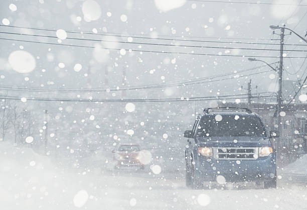 What do you call a snowstorm with strong winds and low visibility?